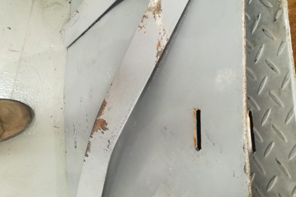 Previously installed covers had also begun to corrode