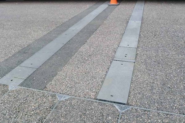 Previously installed covers were unable to withstand heavy loads causing them to crack and deform