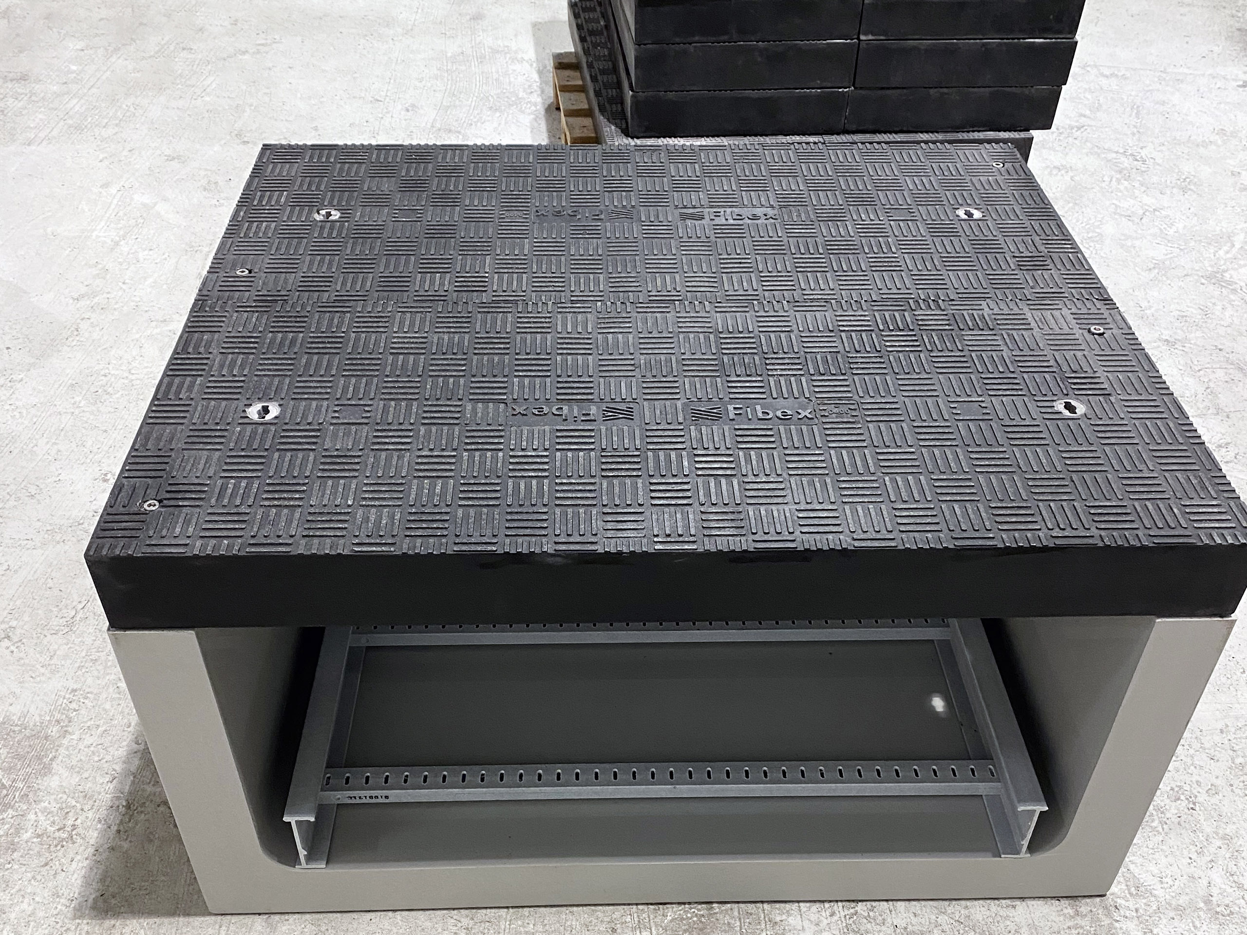 Custom Fibrelite covers designed & engineered to fit precast manufacturer Fibex’s preformed GRP troughs